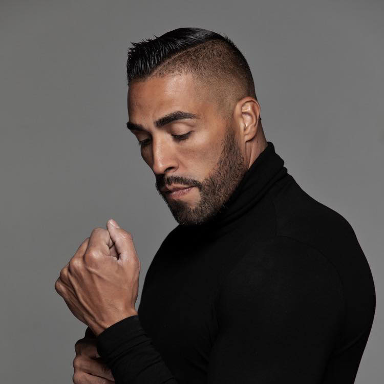 Jess Sanchez in a black turtleneck